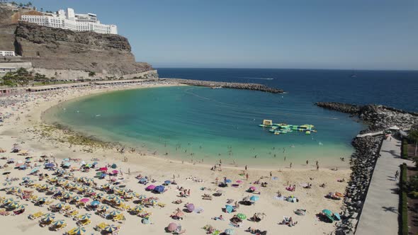 Stunning aerial view over Playa de Amadores artificial beach, Gran Canaria alt