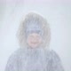 Portrait of a Beautiful Blonde Little Boy in the Winter Forest with Falling Snow - VideoHive Item for Sale