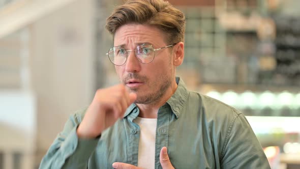 Portrait of Sick Middle Aged Man Coughing alt