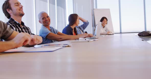 Creative business team having fun in conference room alt