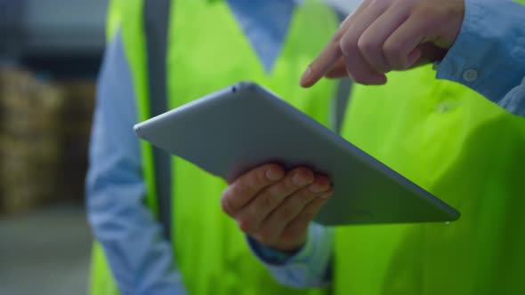 Closeup Warehouse Workers Tablet Information Checking Manufacture Inspection alt