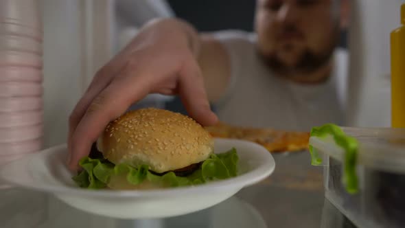 Addicted to Fast Food Male Eating Fridge Burger at Night, Unhealthy Lifestyle alt
