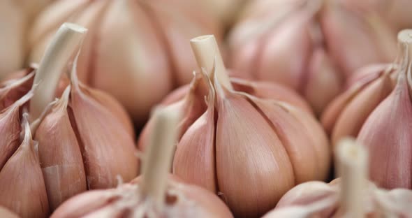 fresh garlic closeup rotating. Eco friendly food concept alt