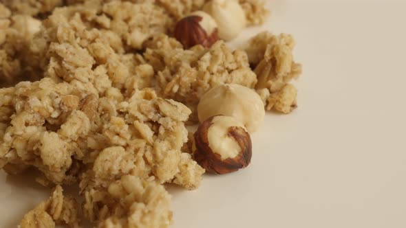 Tilting over  bag with dehydrated  crunchy cereals 4K 2160p 30fps UltraHD footage - Sweet muesli wit alt