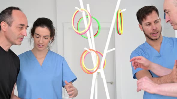 Group of Patients with a Disability Exercising in Rehabilitation Hospital alt