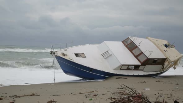 ship aground on the beach during a tempest alt