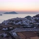 Aerial Hyper Lapse Above Typicall Greek Village at Sunset Overlooking the Aegean Sea, Cyclades - VideoHive Item for Sale
