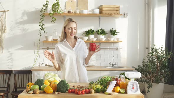 Female Dietitian Talks About Healthy and Proper Nutrition in the Kitchen alt