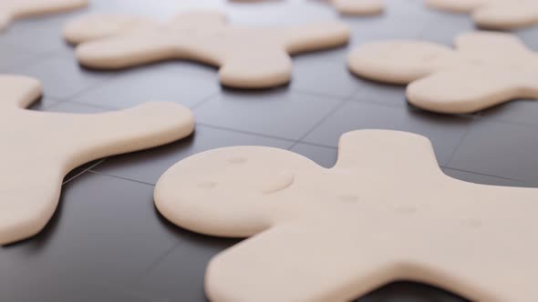 The process of baking a gingerbread man. alt