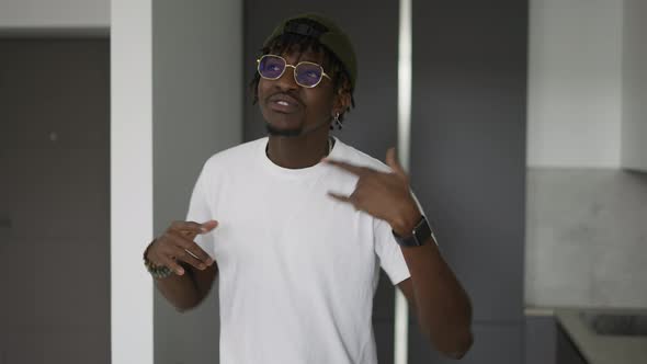 Young Guy Making Dance at Home alt