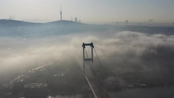 aerial video of bosphorus Bridge on a foggy day in Istanbul, Turkey, Martyrs Bridge  alt