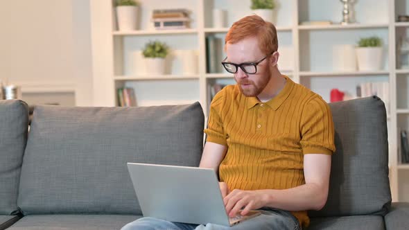 Professional Young Man Using Tablet in Office alt