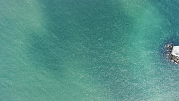 Aerial Drone View of a Breakwater alt
