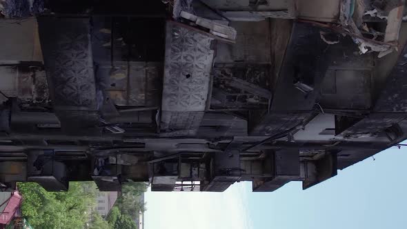 Vertical Video of Civilian Cars Destroyed During the War in Ukraine alt