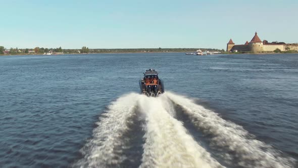 the Boat Floats Among the Skerries in Lake Lodoga Aerial Shot alt