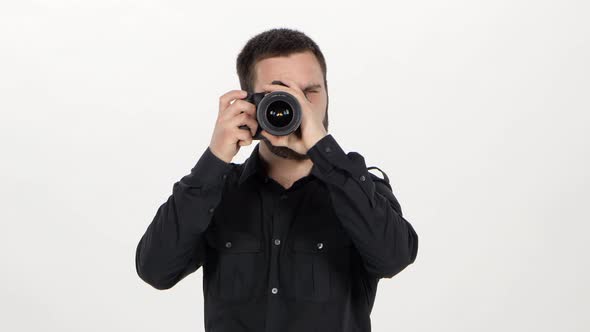 Photographer Holds the Photography. White alt
