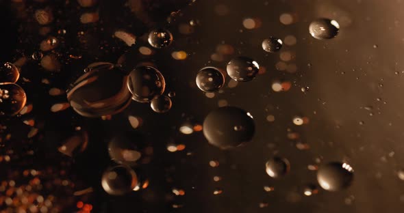 Hydrophobic Fluid Bubbles Merging Underwater