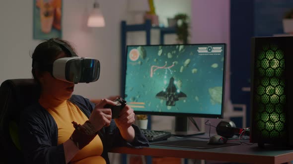 Videogame Player with Vr Goggles Raising Hands After Winning Space Shooter alt