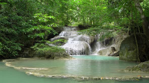 Erawan waterfall level one in National Park, famous tourist destination in Kanchanaburi, Thailand.