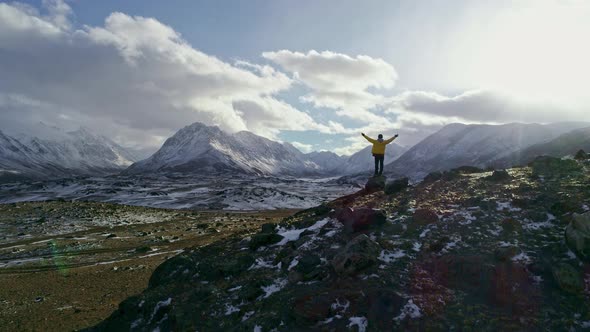 Young Hiker Reaching The Top Outstretched Arms Success Pose At