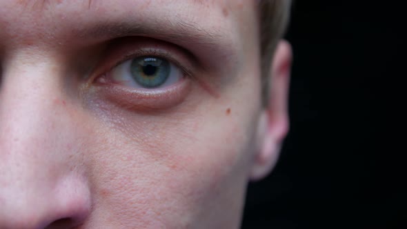 Man Turns Head To The Camera alt