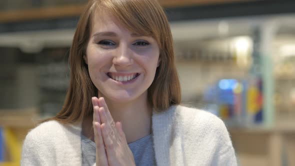 Applauding, Headshot of Happy Young Woman Clapping in Cafe alt
