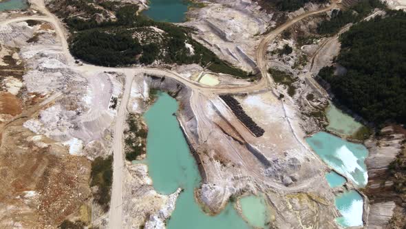 Aerial View Quarry Extraction Porcelain Clay Kaolin with Turquoise Water and White Shor