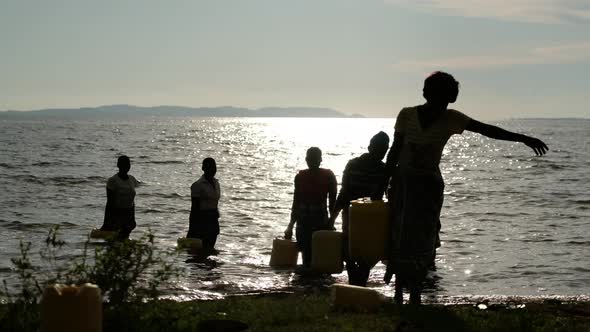 Filling and Transportation of Water Bottles at Lake alt