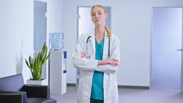 Beautiful Young Nurse Lady Looking Straight To the alt