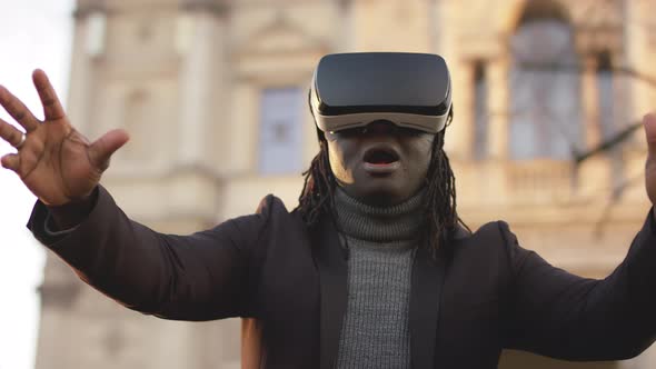 Excited African American Black Man Experiencing Virtual Reality alt