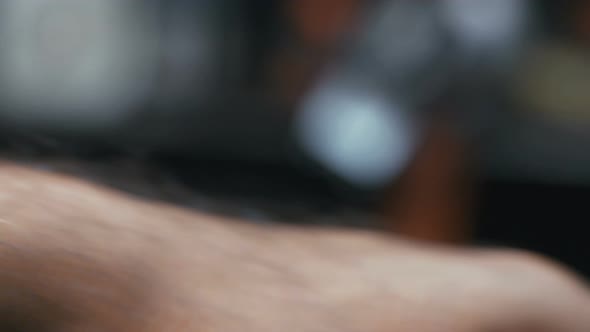 A diamond is polished by a skilled worker in the diamond processing center