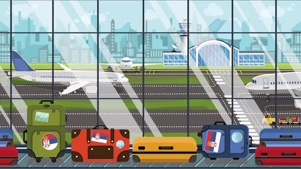 Luggage with Serbian Flag Stickers on Baggage Carousel alt