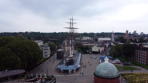 Filming of the Cutty Sark Ship Museum with Historic Houses in the Background