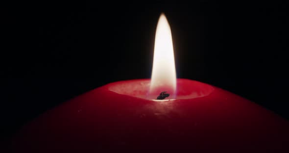 Burning Red Candle