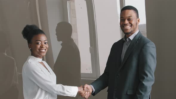 Happy African American Female Hr Bank Manager Insurer Handshake Job Applicant Get Hired at Interview alt