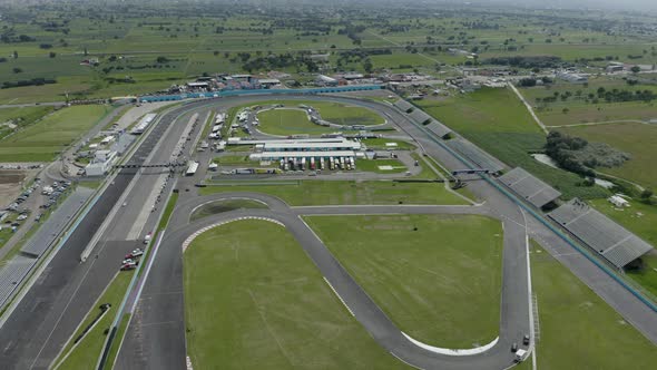 Racing circuit. Aerial view, tilt up alt