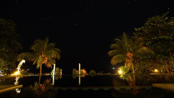 Hotel with a Pool in the Background of the Starry Sky alt