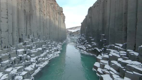 Unique volcanic basalt column formation in Jökuldalur valley, Eastern Iceland. Tourist destination. alt