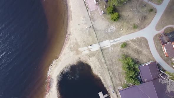 Aerial View of the Vuoksi River, the Forest and the Settlement in Autumn Day, Losevo, Leningrad