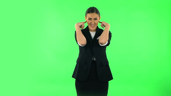 Girl Covers Her Ears, Too Loud. Green Screen alt