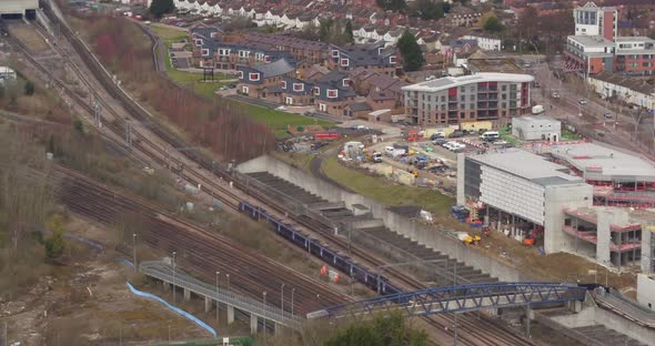 Aerial View of HS1 (high speed train) leaving Ashford International train station, Ashford, Kent, UK alt