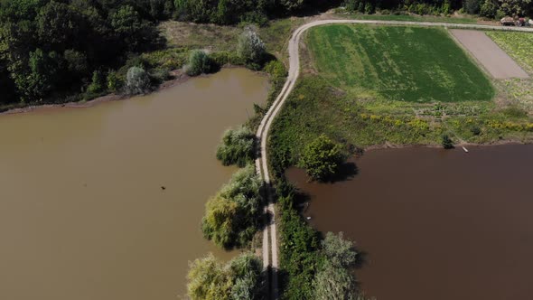 Aerial view of the meadow and lake. alt