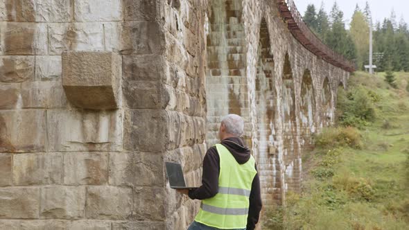 Senior Male Engineer to Restore Ancient Buildings or Bridges alt