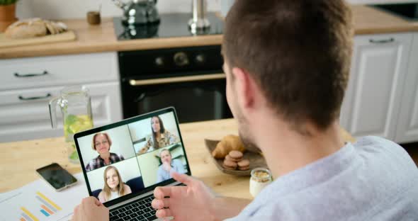 Online Group Video Call Conference of Work Team From Kitchen or Home Office