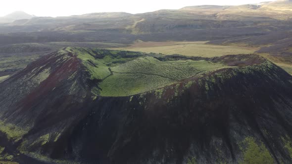 Fast Flight Over Green Volcanic Crater