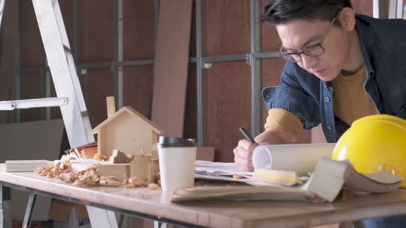 smart attractive handy glasses asian male craftman or interior designer f alt