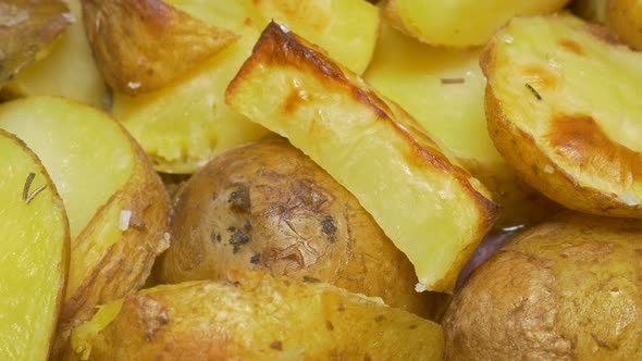 Roasted potatoes tasty food background 4K 2160p UHD video - Tasty potatoes food panning 4K 3840X2160 alt