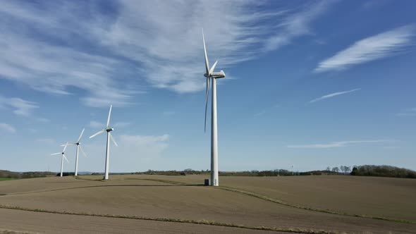 Drone Over Fields Of Wind Turbines alt