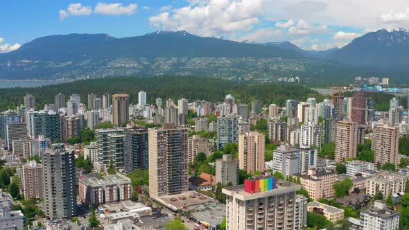 Sandman Suites Building Within The Cityscape In West End Area In Downtown Vancouver, Canada. aerial alt