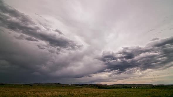 Dramatic clouds moving through the sky as severe thunderstorm follows in Montana alt